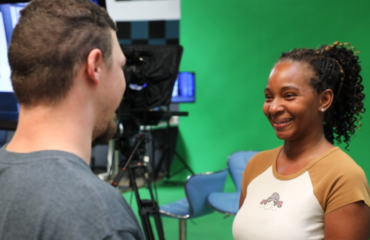 Sherelle working on set with JDS Creative Academy’s production team during her externship program.