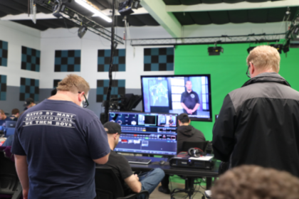 Neurodivergent creators working on digital media projects, collaborating, and learning skills at JDS Creative Academy in an inclusive, supportive environment.