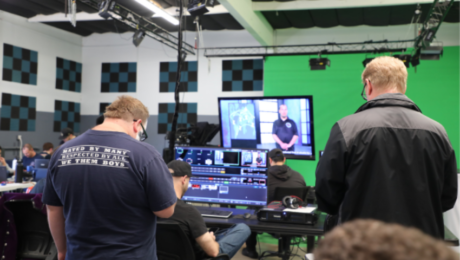Neurodivergent creators working on digital media projects, collaborating, and learning skills at JDS Creative Academy in an inclusive, supportive environment.