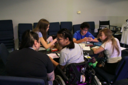 Students and instructors working together backstage at JDS Creative Academy