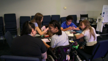 Students and instructors working together backstage at JDS Creative Academy