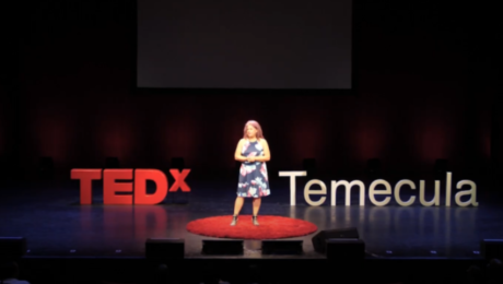 Diane Strand speaking at a creative arts event, empowering students and entrepreneurs through JDS Creative Academy and DigiFest® Temecula in California.