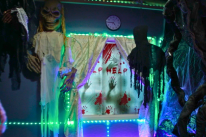 JDS Creative Academy students creating a haunted theater experience, learning lighting, sound, and storytelling skills during Halloween.