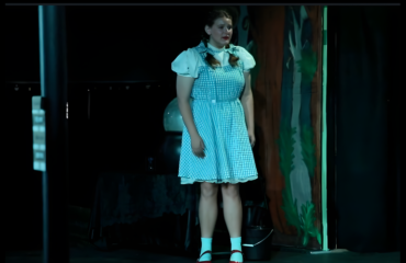 Students performing on stage at JDS Creative Academy, learning teamwork, confidence, and life skills through theater education.