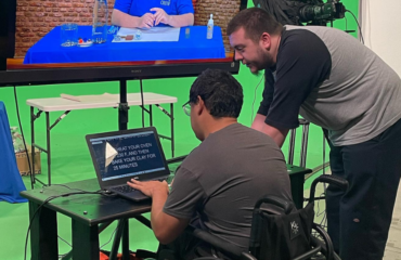 Students collaborating on a digital media project at JDS Creative Academy, learning video production and creative storytelling