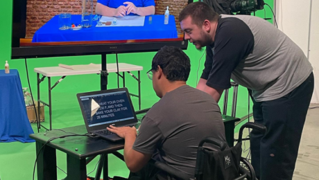 Students collaborating on a digital media project at JDS Creative Academy, learning video production and creative storytelling