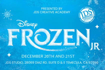 Frozen Jr. cast performing on stage at the JDS Creative Academy Winter Showcase with students in colorful costumes expressing emotion and teamwork