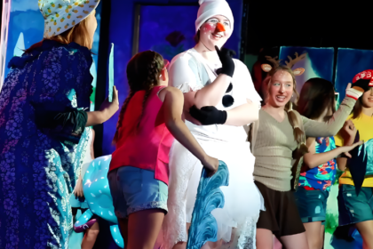 Students performing, filming, or editing projects at JDS Creative Academy showcasing hands-on learning and creativity